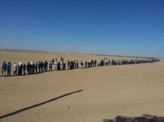 A demonstration forming a human chain around Kobani against the Islamic State.